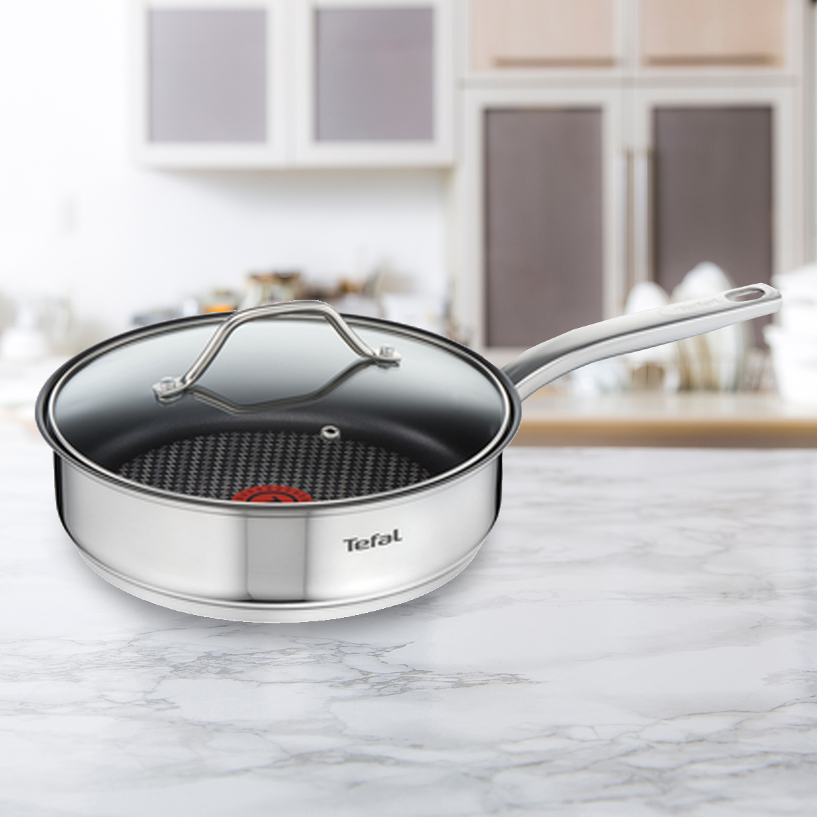 Intuition Coated 24cm Sautepan with Lid